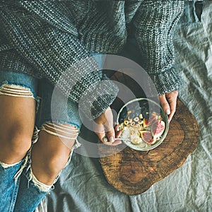 Healthy vegetarian winter breakfast in bed concept, top view