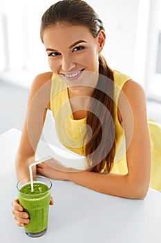 Healthy Woman Drinking Green Detox Juice. Lifestyle, Food, Drin