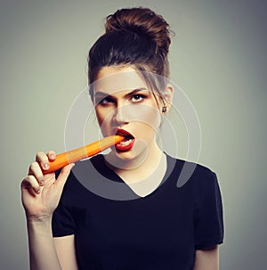 Healthy Woman Eating Carrot