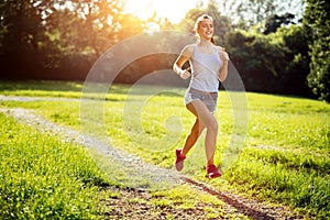 Healthy woman jogging early in the morning