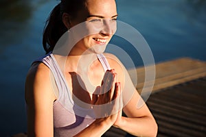 Healthy woman lifestyle balanced practicing meditate and energy yoga on the bridge in morning the nature. Healthy