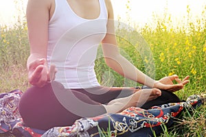 Healthy woman meditation field.