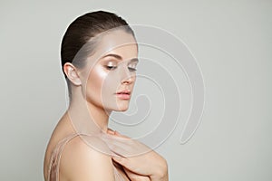 Healthy woman portrait. Pretty model with clear skin. Skincare and facial treatment concept