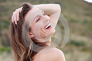 Healthy woman smiling outside