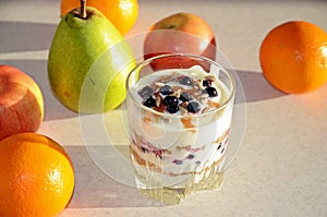 Healthy yogurt with mix of berry, sunflower seeds, bran and honey for healthy morning meal