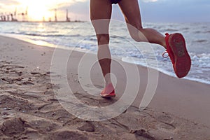 Healthy young fitness woman trail runner running on sunrise seaside