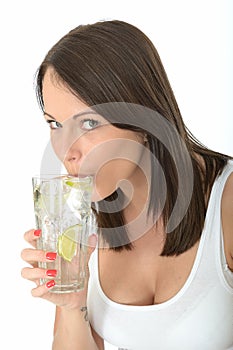 Healthy Young Woman Drinking a Glass of Fresh Iced Water