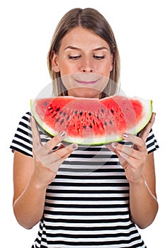 Healthy young woman eating watermelon