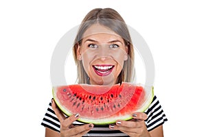 Healthy young woman eating watermelon