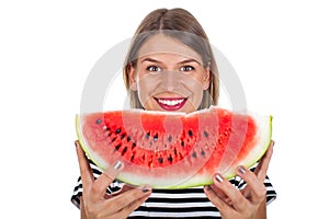 Healthy young woman eating watermelon