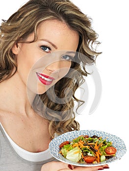 Healthy Young Woman Holding Plate of Mixed Colourful Healthy Salad