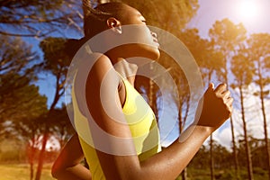 Healthy young woman running outdoors