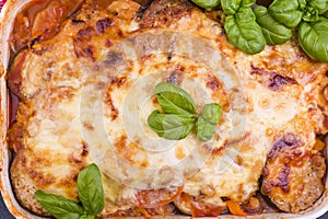 Healthy zucchini lasagna bolognese in a baking dish.Oven baked traditional Italian cuisine with mozzarella, parmesan