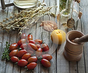 Healty Food on The Table, Cherry Tomatos, Herbs, Lemon, Tea