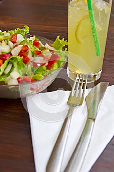 Healty and fresh salad with lemonade