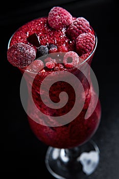 Healty and tasty glass of forest fruit