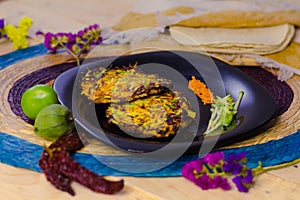 Healty vegetarian mexican food served on a black dish