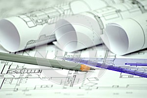 Heap of architectural design and project blueprints drawings of
