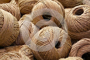 Heap of balls of very rough and rough twine for sale in the habe
