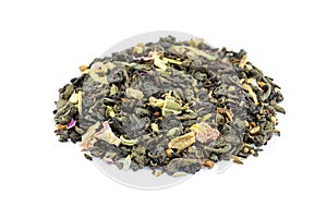 Heap of biological loose Flower Power tea on white