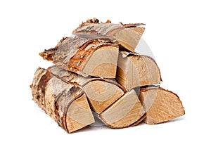 heap of birch firewood logs isolated on white