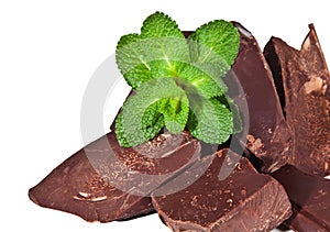 Heap of black chocolate with mint