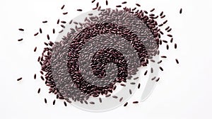 Heap of black rice grains on a white background, top view. Black rice texture. Suitable for food and nutrition related