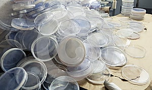 Heap of blank culture plates in a microbiology lab