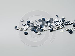 Heap of blue sapphires on a clean white backdrop