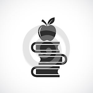 Heap of books and apple vector sign