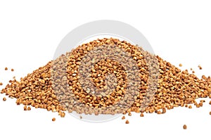 Heap of buckweat grains on white background