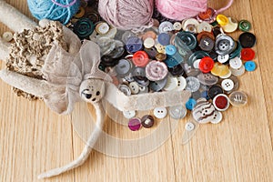 Heap of button on wood table