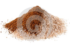 Heap of cinnamon sugar with a splash of ground cinnamon isolated on white