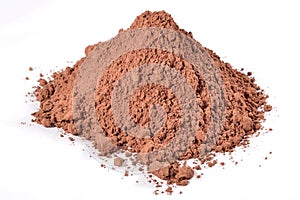 Heap of cocoa powder on a white