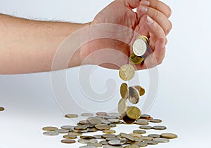 Heap of coins in the hand