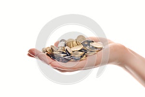 Heap of coins in woman hand