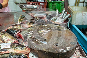 Heap of colorful fresh fish heads at the Singapore wet market in