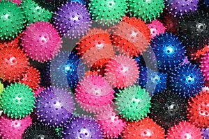 Heap of colorful massage balls with nubs, full frame photo