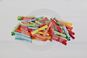 Heap of colorful tombola tickets are lying on a silver ground with mirror effect