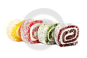 Heap of colorful Turkish delight isolated on white background. Turkish sweets isolated on white background. Ramadan.