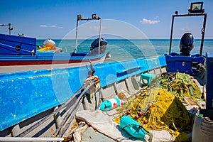 Heap of commercial fishing net on ship`s deck