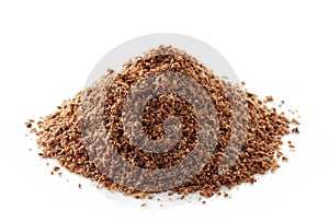 Heap of crushed flax seeds