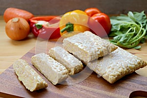 Heap of Cut Fresh Tempeh for Cooking Whole Foods Plant-based Dishes