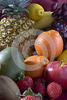 A heap of cut tropical fruits