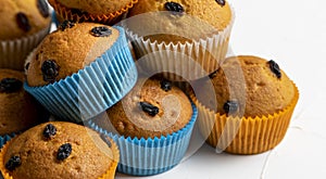 Heap of delicious raisin muffins, close-up