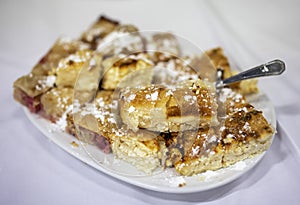 Heap of delicoius strudel stuffed with apfel and cottage cheese photo