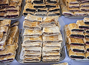 Heap of delicoius strudel stuffed with poppy apfel and cherry