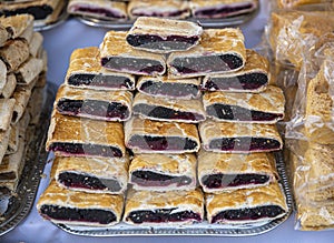 Heap of delicoius strudel stuffed with poppy apfel and cherry photo