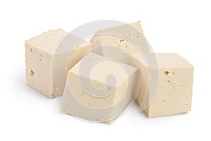 Heap of diced tofu cheese isolated on white background with clipping path and full depth of field,