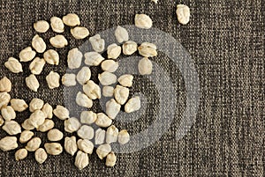 Heap of dried chickpeas on cloth, chickpea are high in vegetable protein